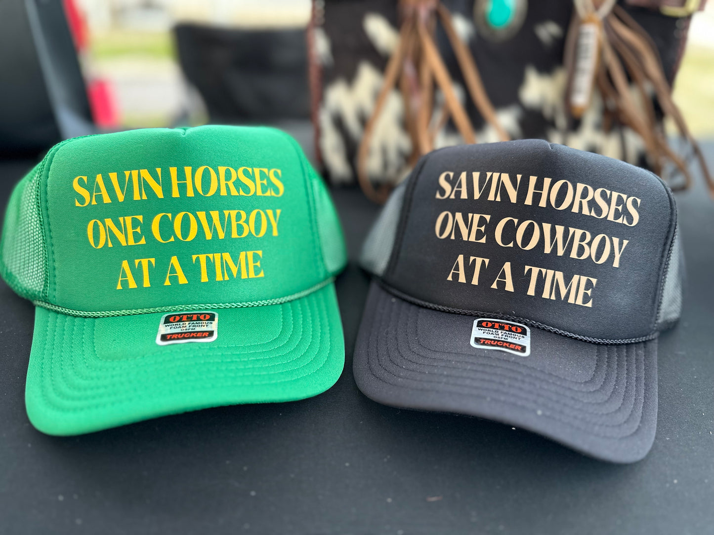 Savin Horses One Cowboy at a Time Trucker Hat